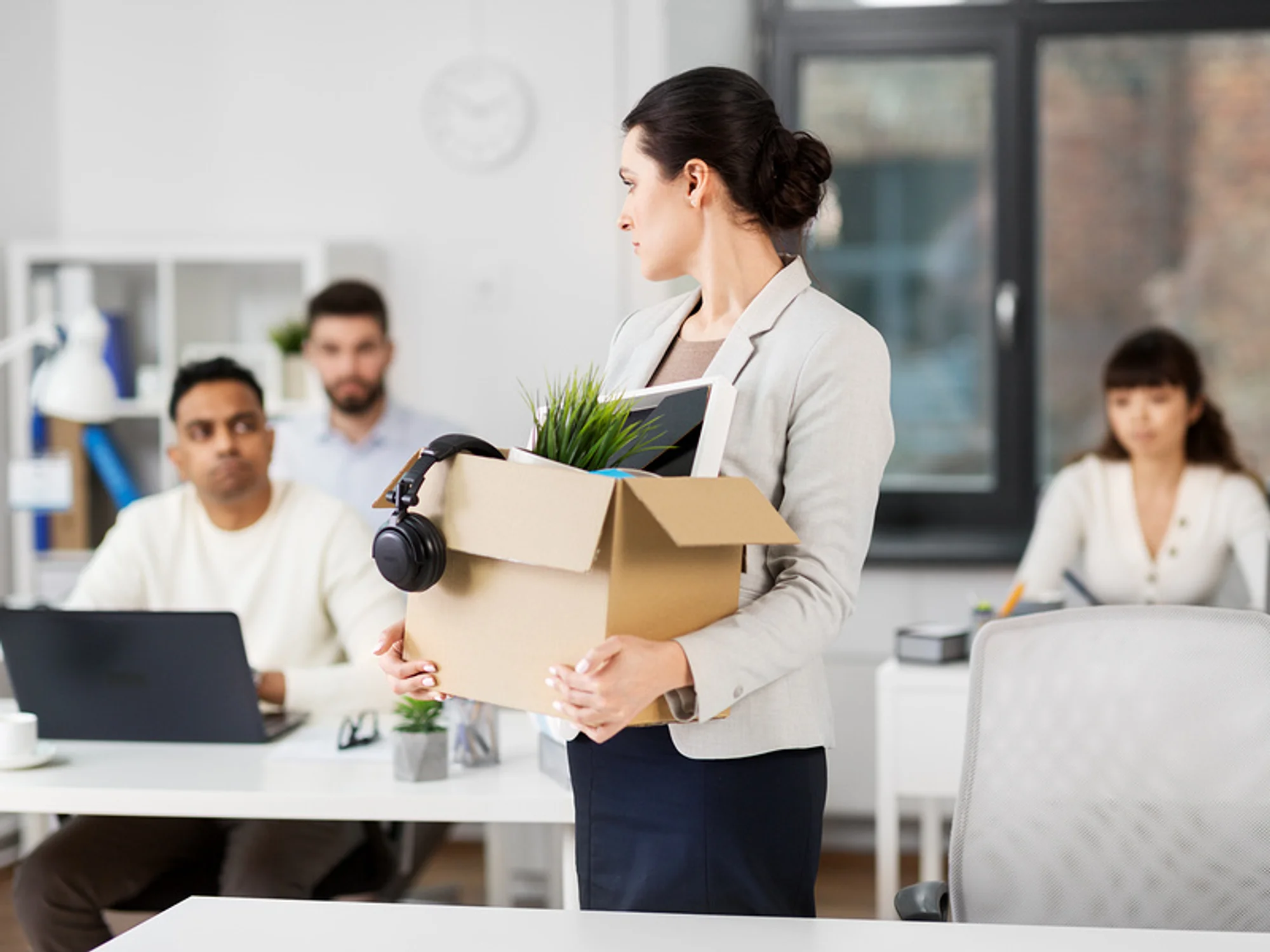 woman-leaves-work-after-being-fired-from-her-job
