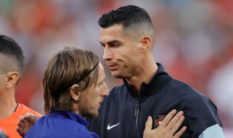 Cristiano-Ronaldo-and-Luka-Modric-shake-hands-ahead-of-a-match-between-Portugal-and-Croatia